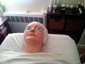 NYC - My facial at Pacific Touch NYC with a Vitamin C mask on my face
