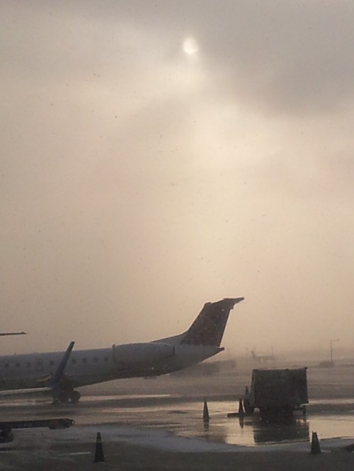 Chicago - It's snowing when we land